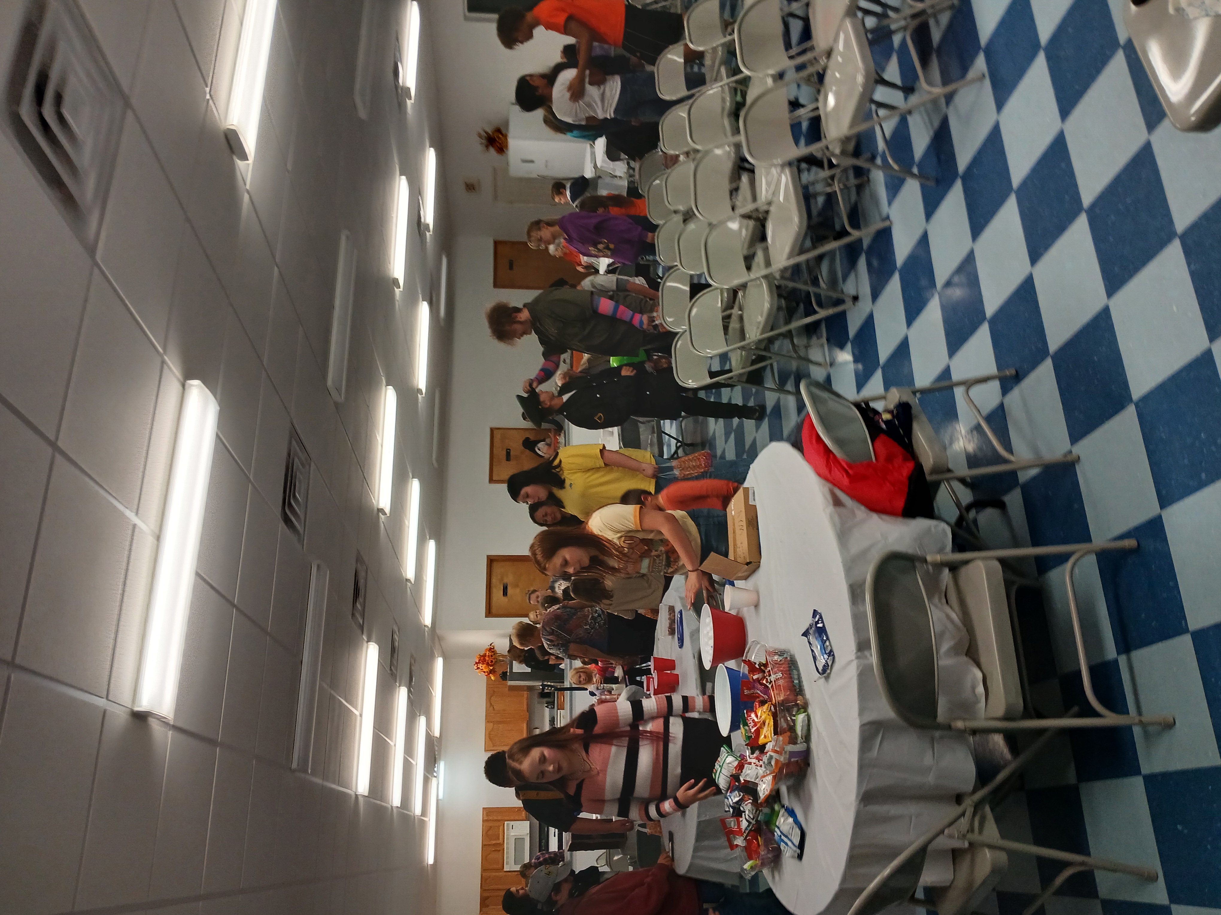 Church family together in the fellowship hall